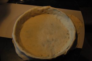 Pizza Pie Dough in pan photo